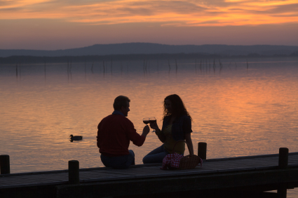 Couple Having Dinner Near Lake